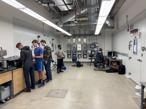 Lorenzo Graham presents some research during a School of Management marketing class in the Gruening Building. UAF photo by Todd Paris.
