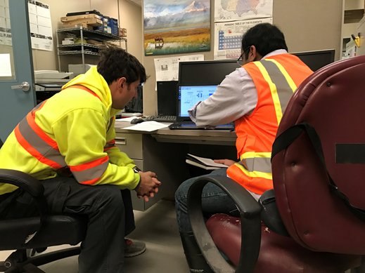 Students work on a training mill simulator at Pogo mine. Photo by Aibyek Khamkhash.