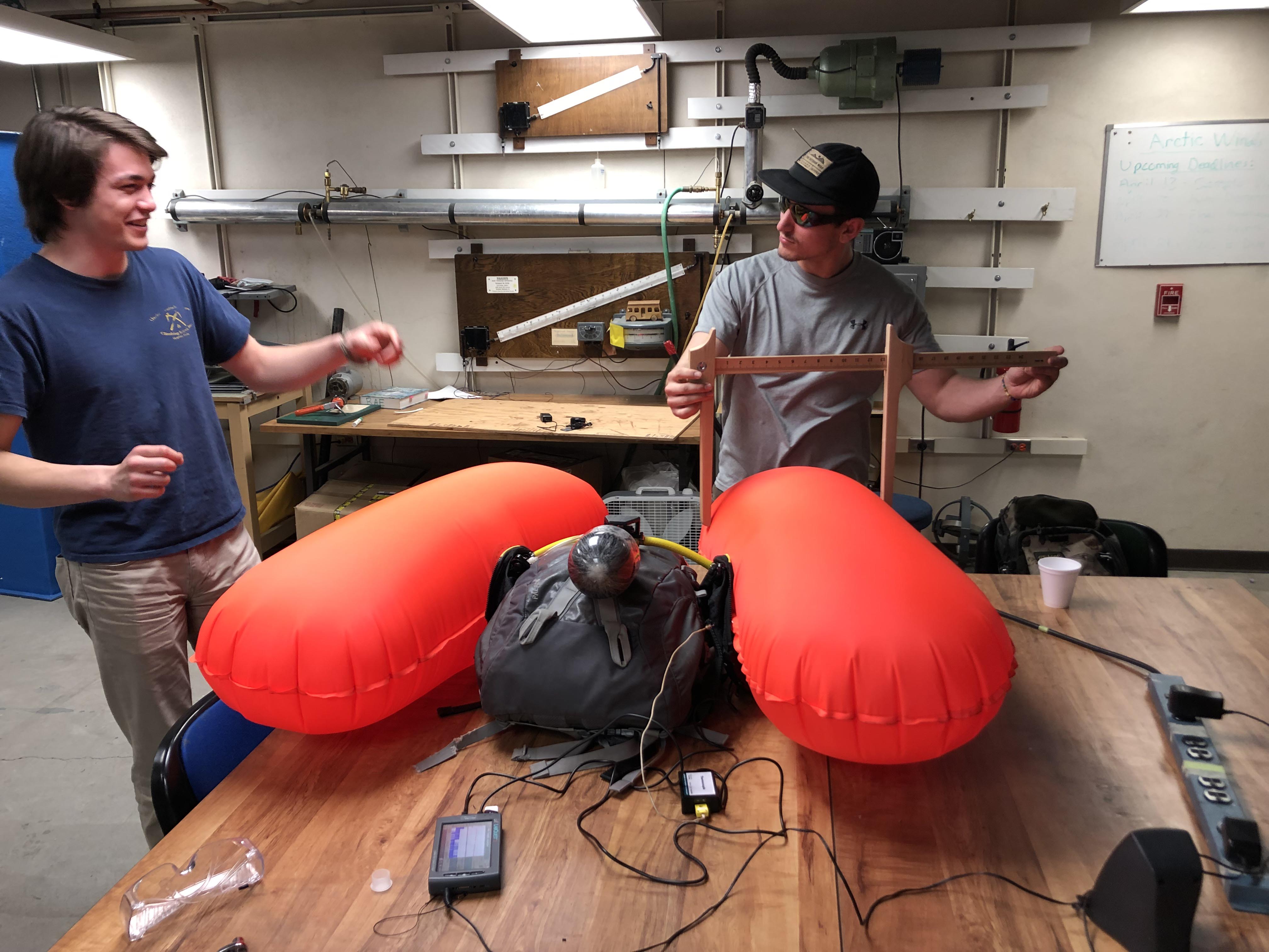 Avy Pouch team works on their innovative avalanche safety backpack. Photo by Riley Bickford.