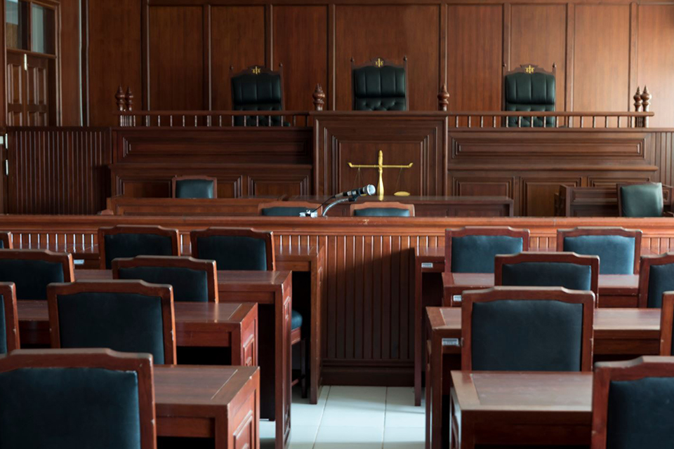 View of an empty courtroom facing the bench | Stock photo from Canva