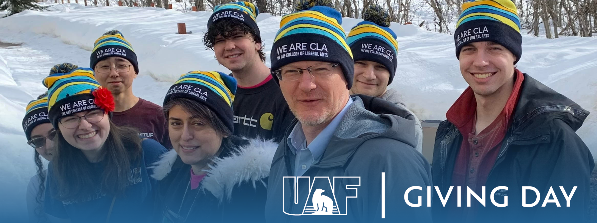 Students and faculty from the UAF Japanese Studies program wear CLA beanies in a group photo. UAF Photo