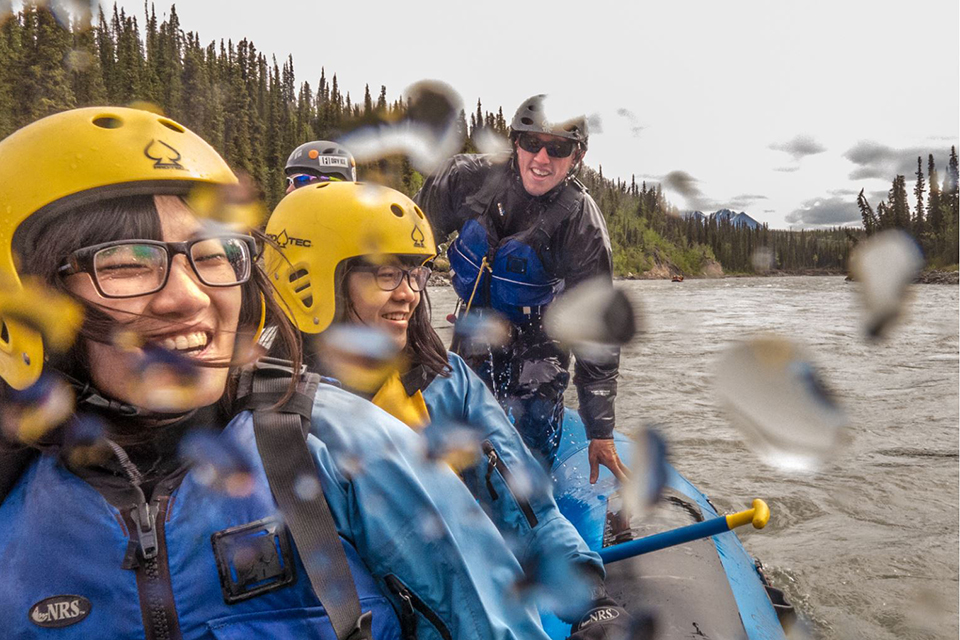 International students Ko-Fan Lu, front, and Chien-An Peng joined UAF Outdoor Adventures recreation manager Sam Braband and others on a raft trip down the Nenana River in June, 2014.