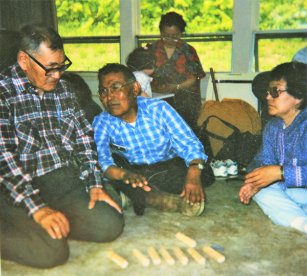 From left to right are Joshua Phillip, Henry Alakayak, and Mary George demonstrating the Yupiaq counting system. Many Elders explored the Yupiaq counting system.