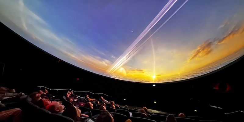Audience in planetarium dome