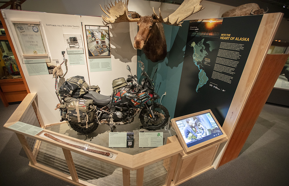 exhibit with a motorcycle and moose head