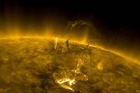Solar flare coming from the surface of the Sun.