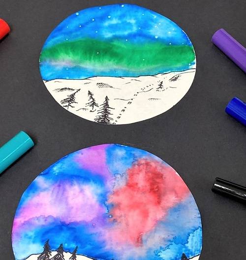 Closeup of a circular watercolor painting of the aurora, with markers visible on the edges..