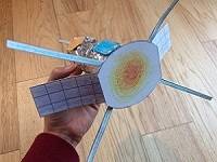 Example model solar probe, made from toilet paper tube, aluminum foil, and paper.