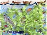 Kelp forest collage made of blue paper, green tissue paper, and colored cutouts of marine animals.