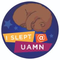 Drawing of a sleeping cartoon bear, when the words "I slept at UAMN."