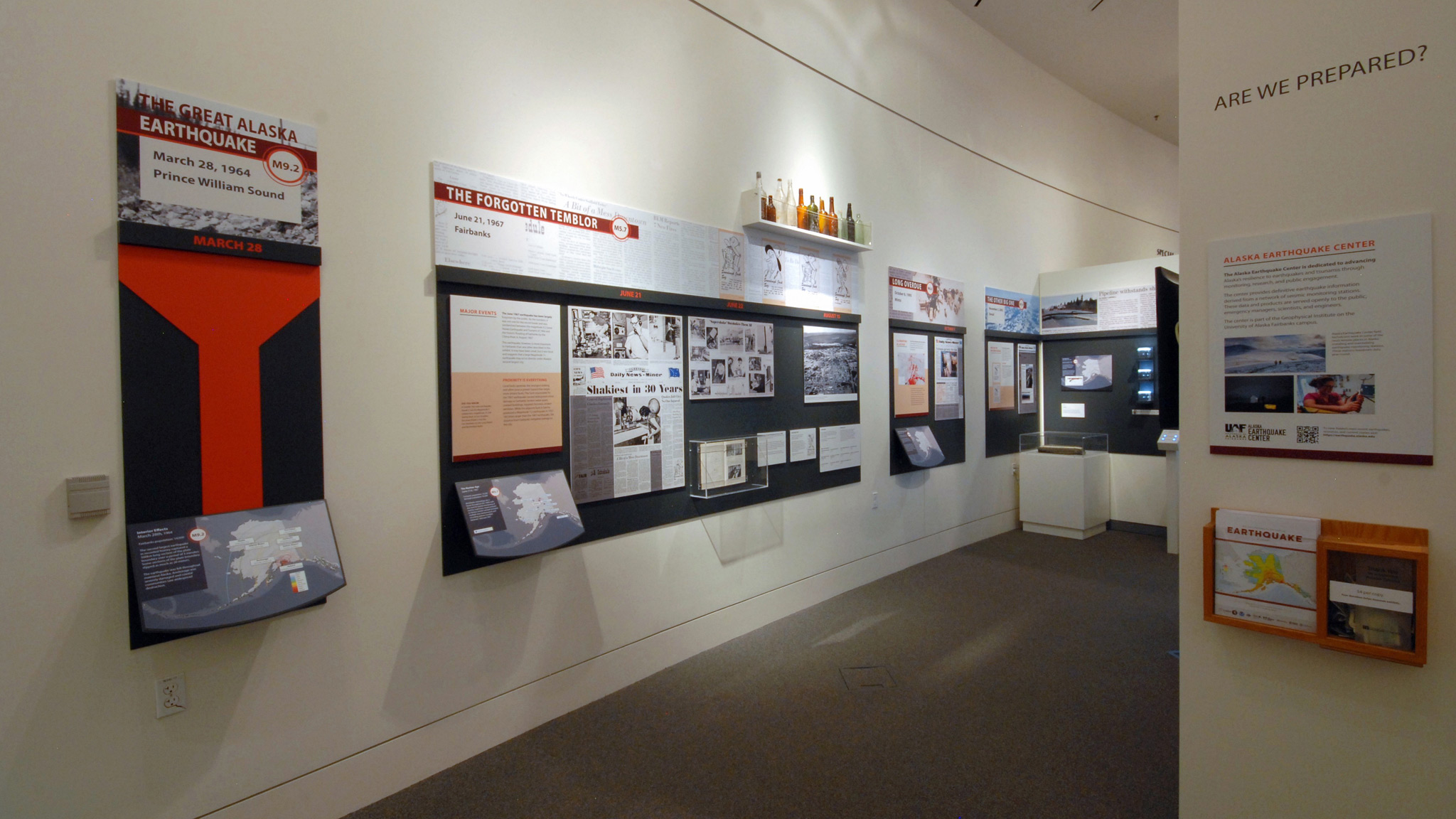 Looking west along the south wall of the gallery and the exhibits for the 1964, 1967, 1995, and 2002 earthquake events.