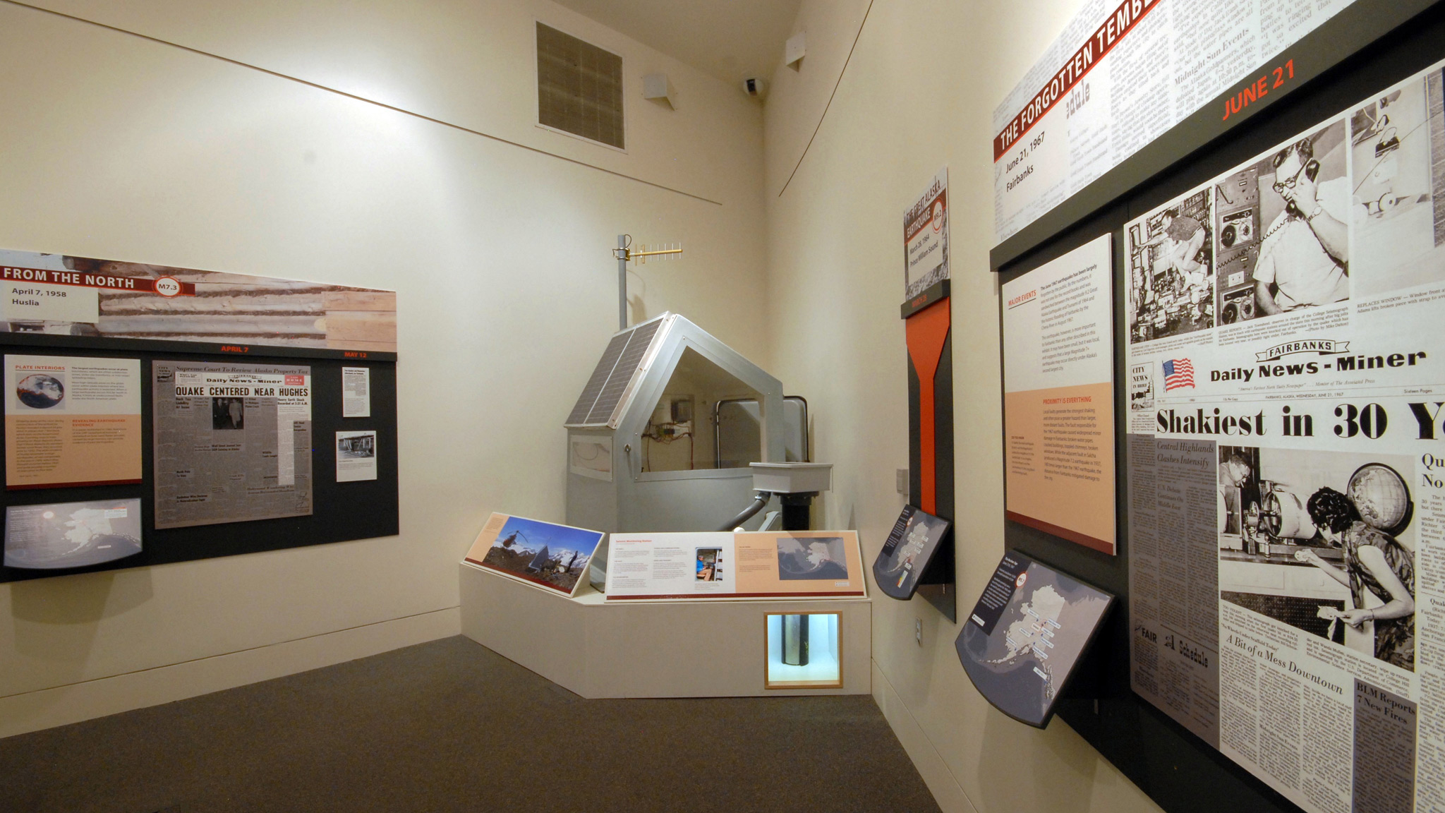 Looking towards the eastern tip of the gallery at the retired earthquake hut and seismometer on exhibit.