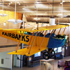 historic plane hanging in the Fairbanks International Airport