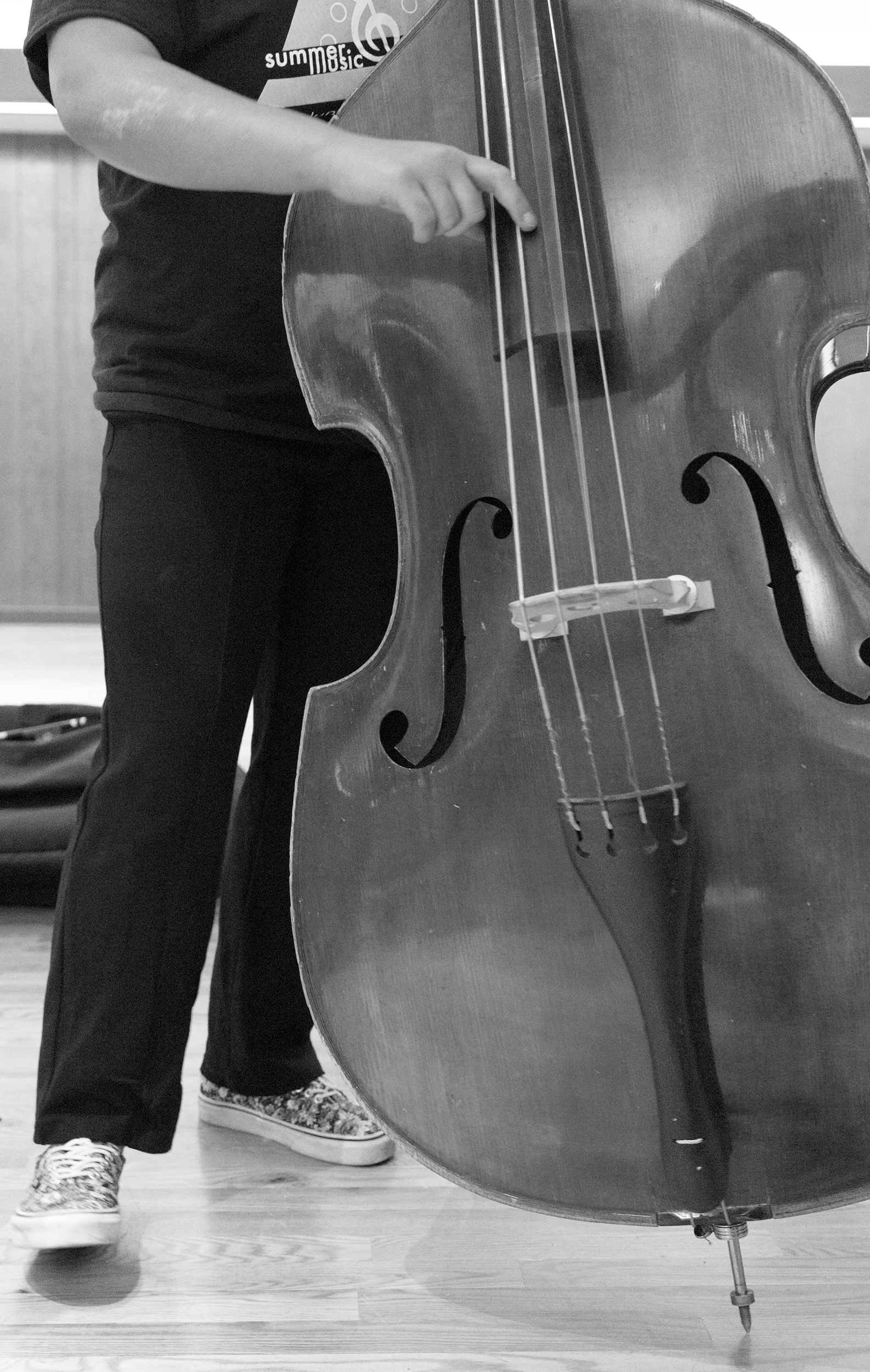 Student playing a string bass