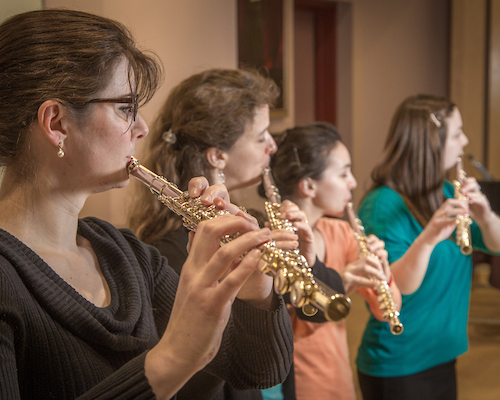 From left to right, Mandi Silveira, Therese Schneider, Meryem Kugzruk and Lilly Gesin are members of a flute quartet at UAF. | UAF photo by Todd Paris