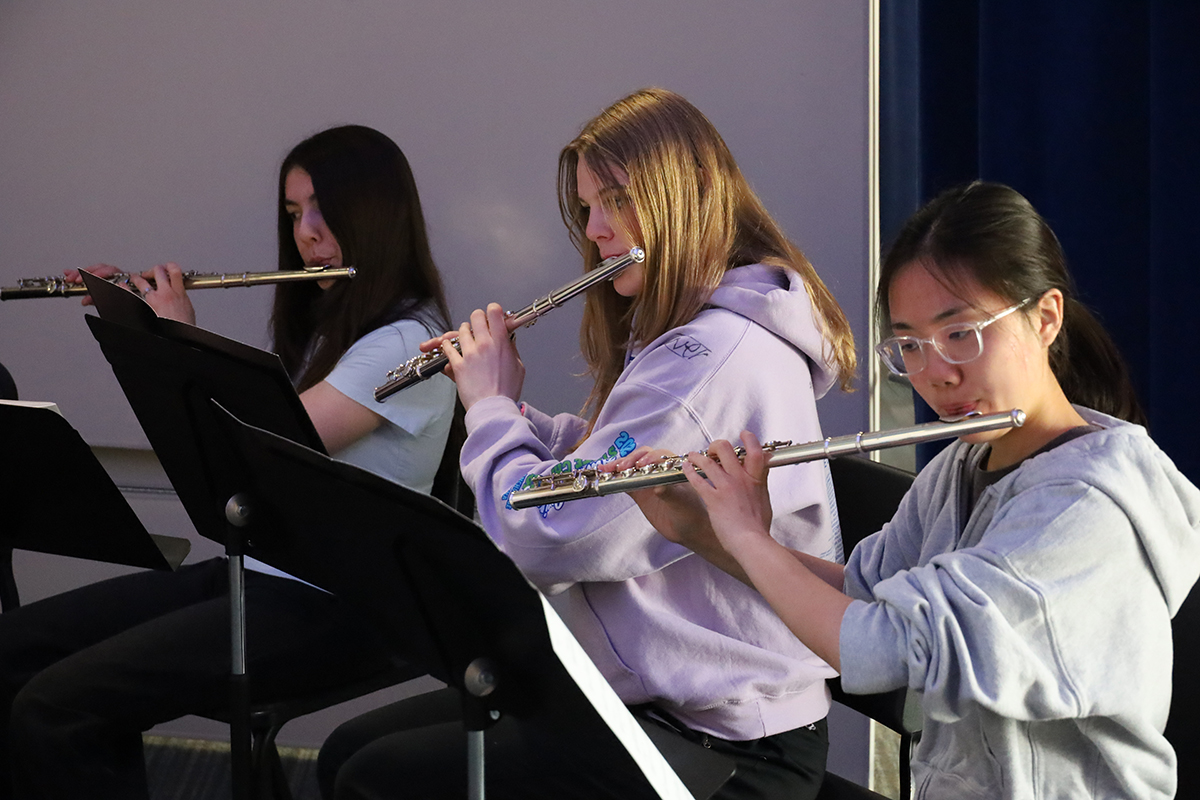 Three flute players during a 2026 Summer Music Academy practice. UAF Photo by Jaunelle Celaire.