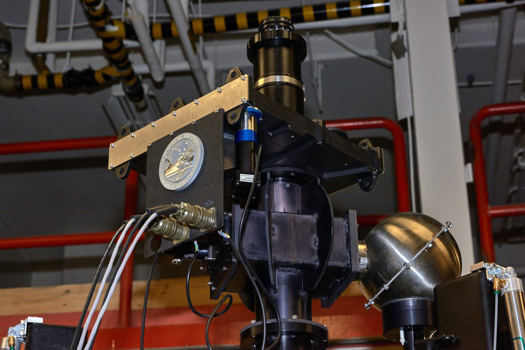 Photo by Mark Conde.The lens of this scanning Doppler imager will be pointed to the sky to measure winds and temperatures 100 miles above the Earth's surface from Antarctica.