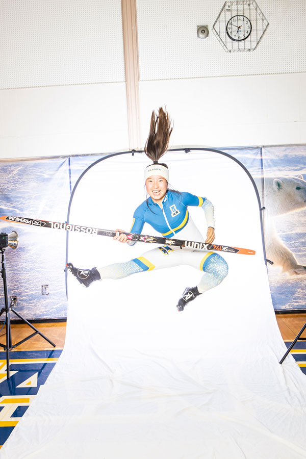 Grace Miller posing for a UAF athletics photo shoot