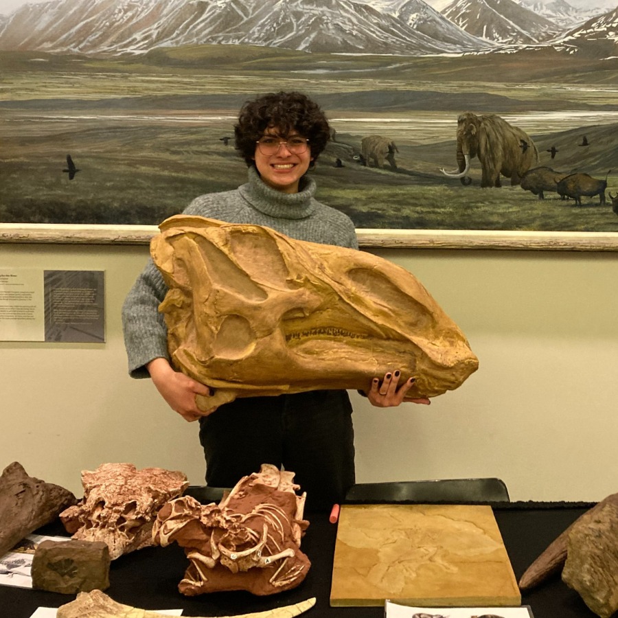 Daniela holding a dinosaur fossil courtesy of Daniela Barrera Guevara