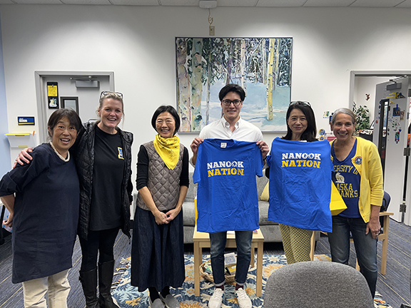 Chisato Murakami, Carrie Baker, officers of the Japan Foundation, and Ellen Lopez pose for a photo in the CLA Dean’s office during the 2023 Japanese Film Festival and Samurai workshop events. UAF photo by Sarah Manriquez.