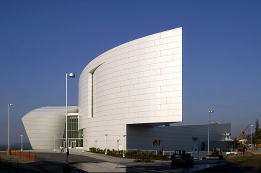 A side view of the museum, contrasting against the sky.