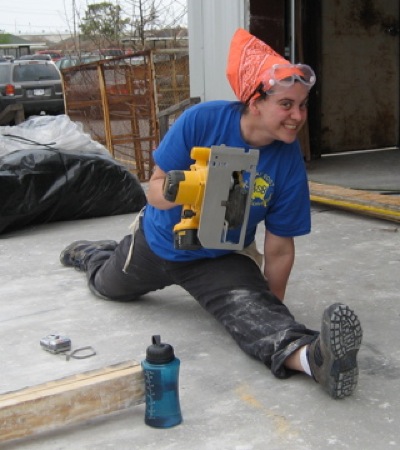 Clarissa Ribbens practices her circular saw technique. Photo by Brian Lyke