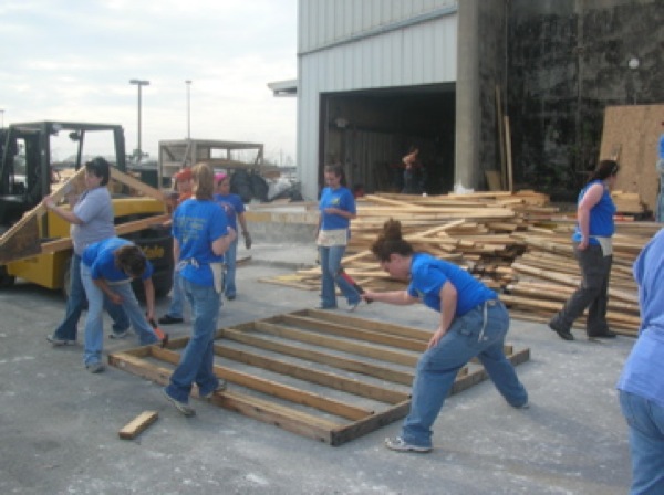 Alexis Fernandez, Megan Richards, Clarissa Ribbens, Erica Schooley, Tabitha Johnson and Kari Pile frame walls. Photo courtesy UAF Leadership Program