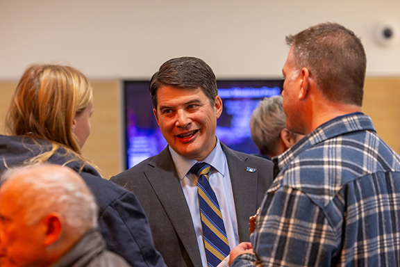 UAF Chancellor Russ Vander Lugt talks with staff and faculty after the formal portion of Convocation on Oct. 13, 2026.