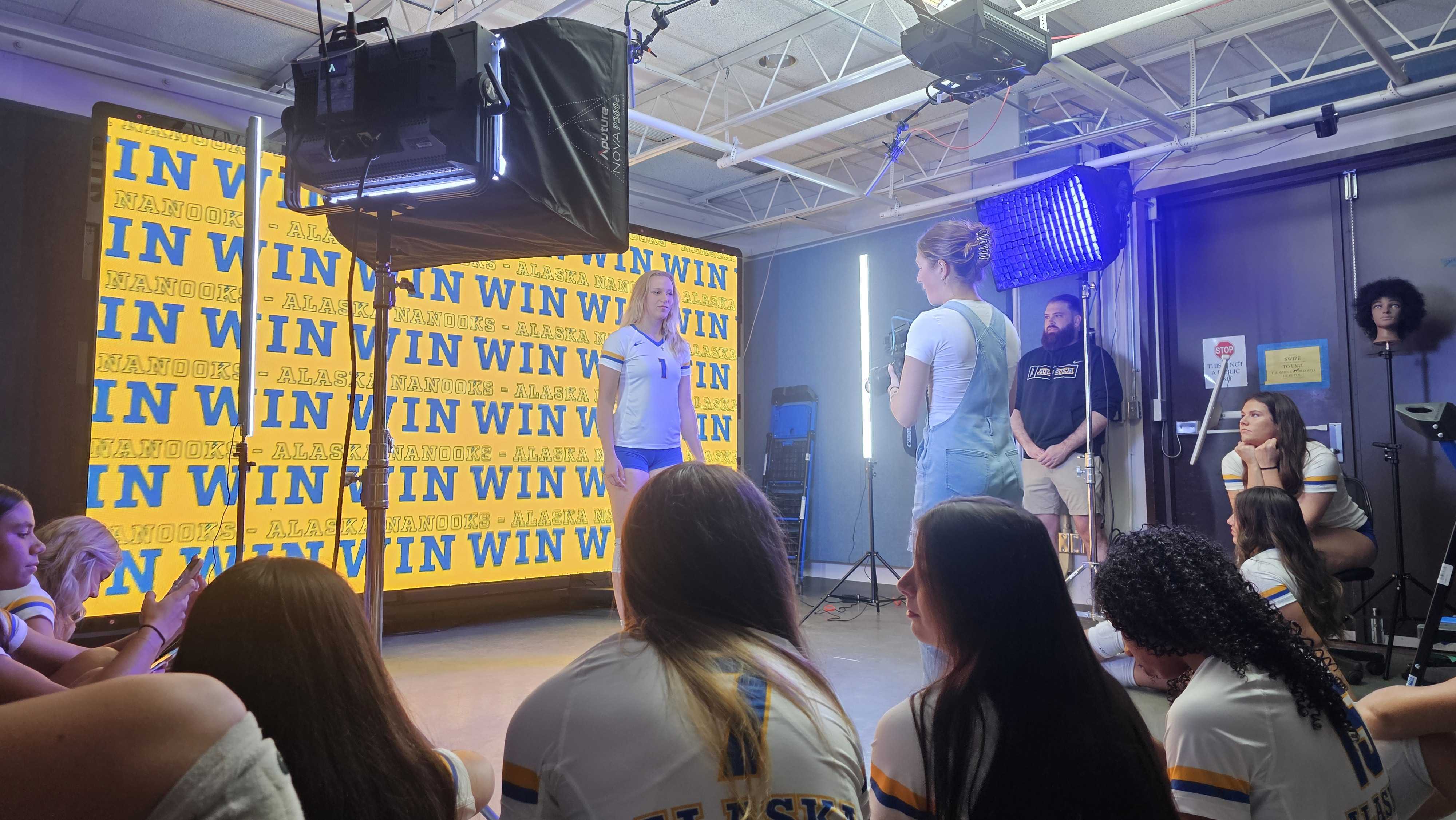 Student athletes record video in the new ArcticVū virtual production studio.