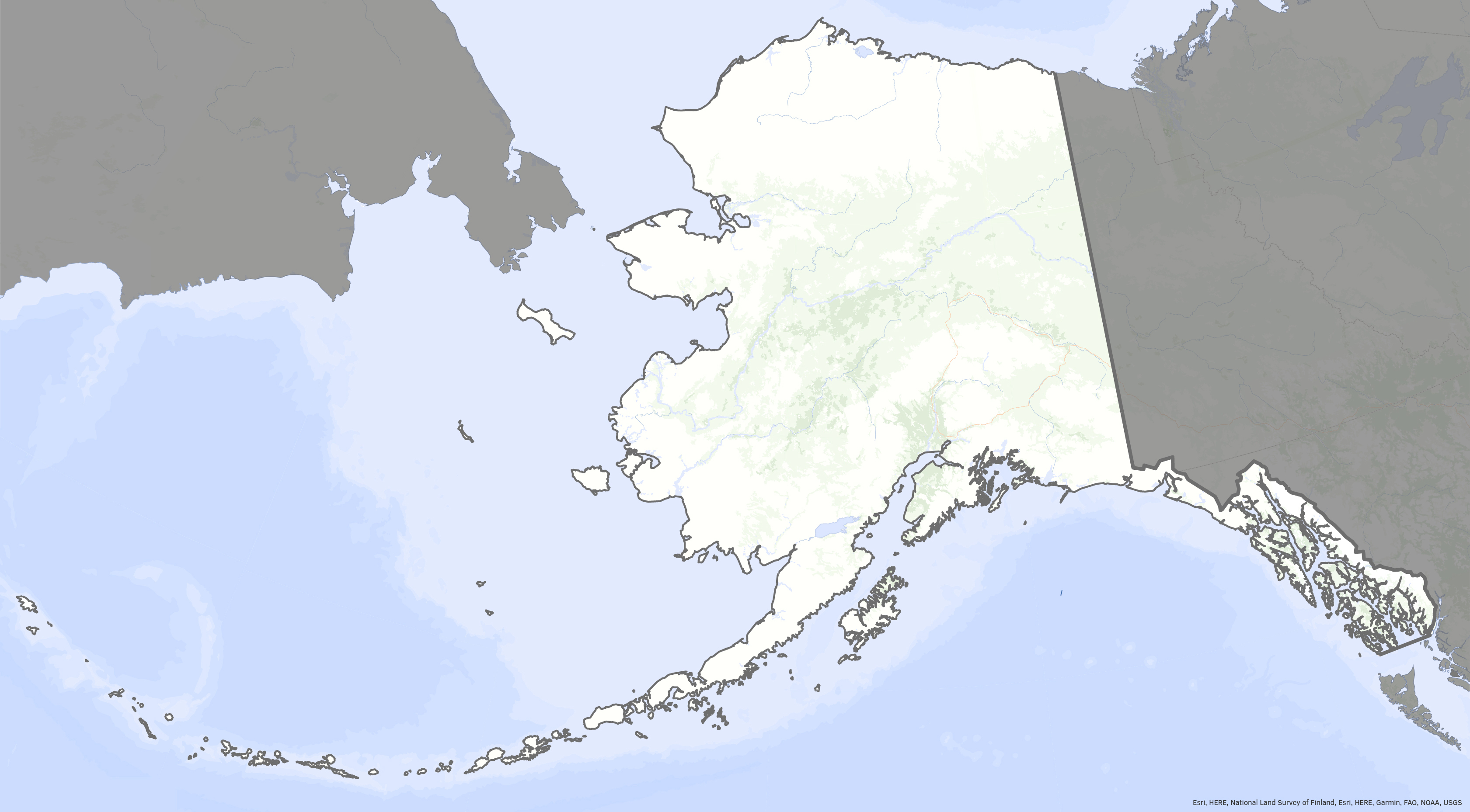 A map of Alaska features the major rivers and lakes in light blue, forested areas in light green and major roads in orange.