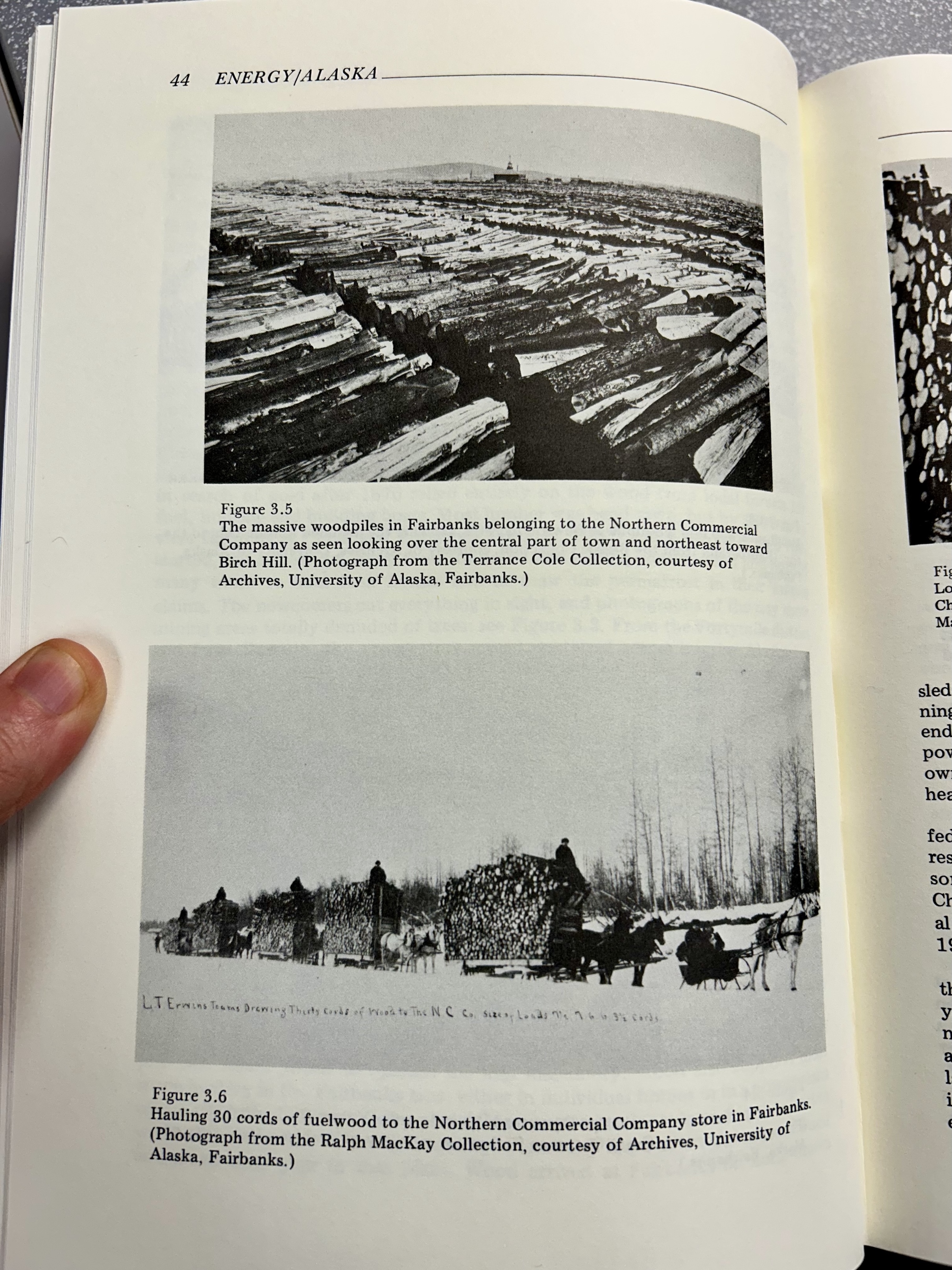 Two photographs of wood harvesting and processing in early Fairbanks, Alaska, on a page of a book.