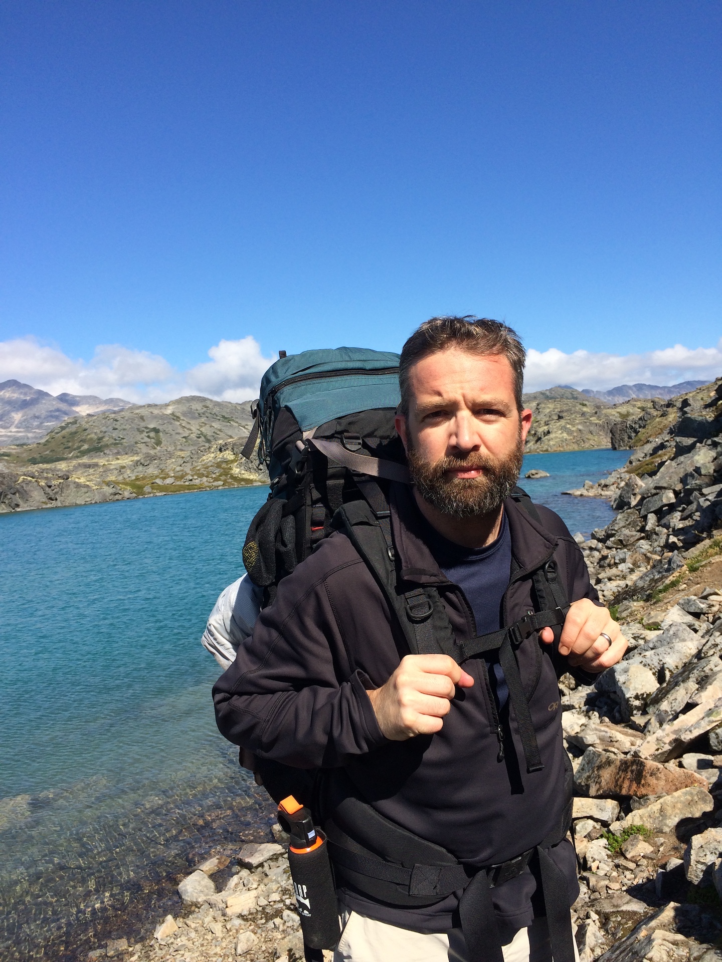 Brian Castner hiking in a scenic area