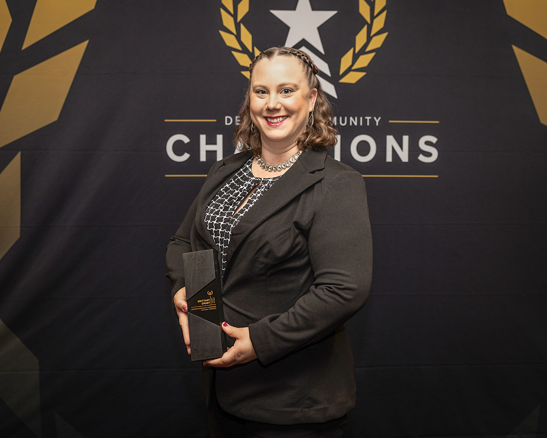 Brittany Smart with award