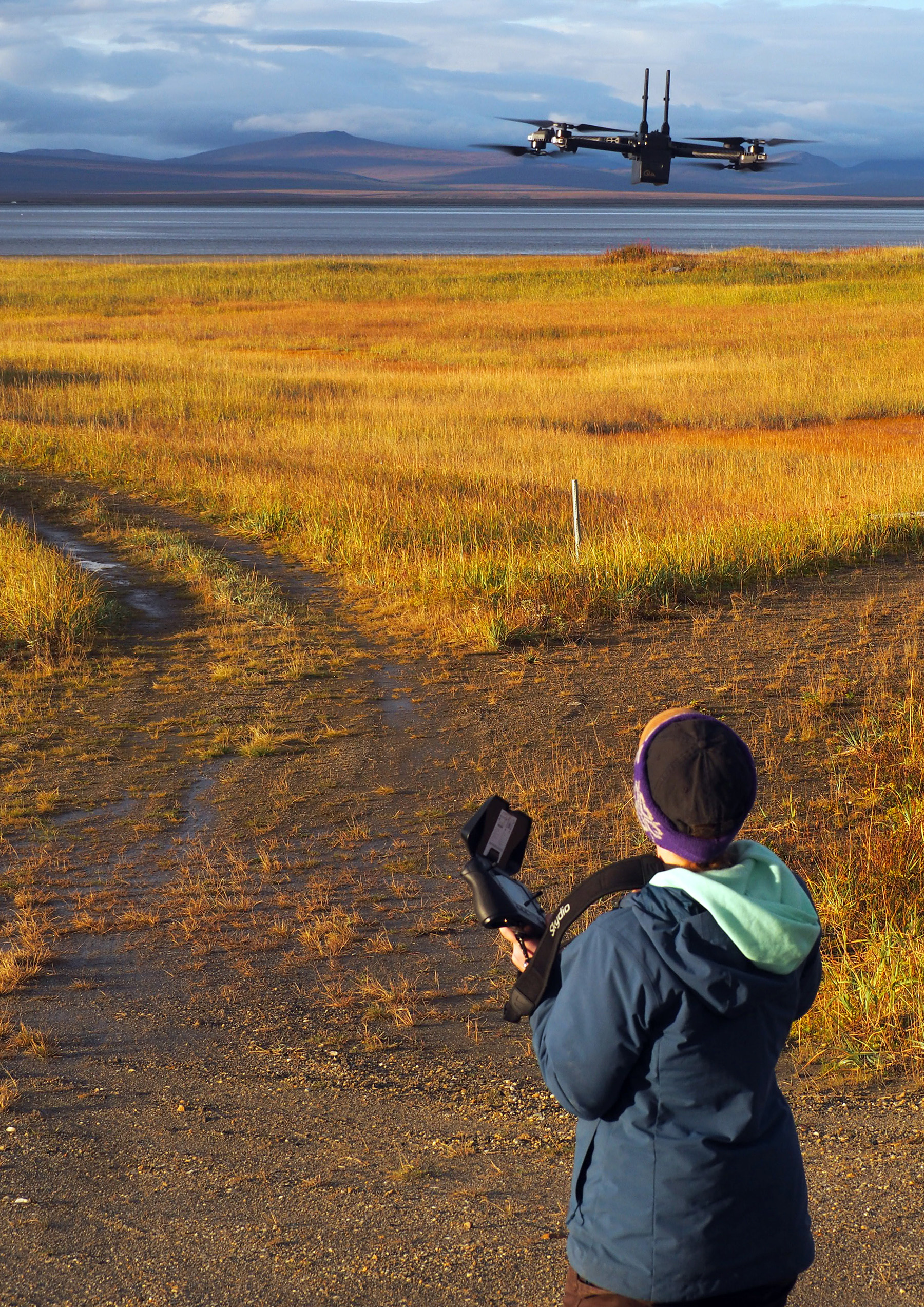 A drone pilot flies a drone near Nome.