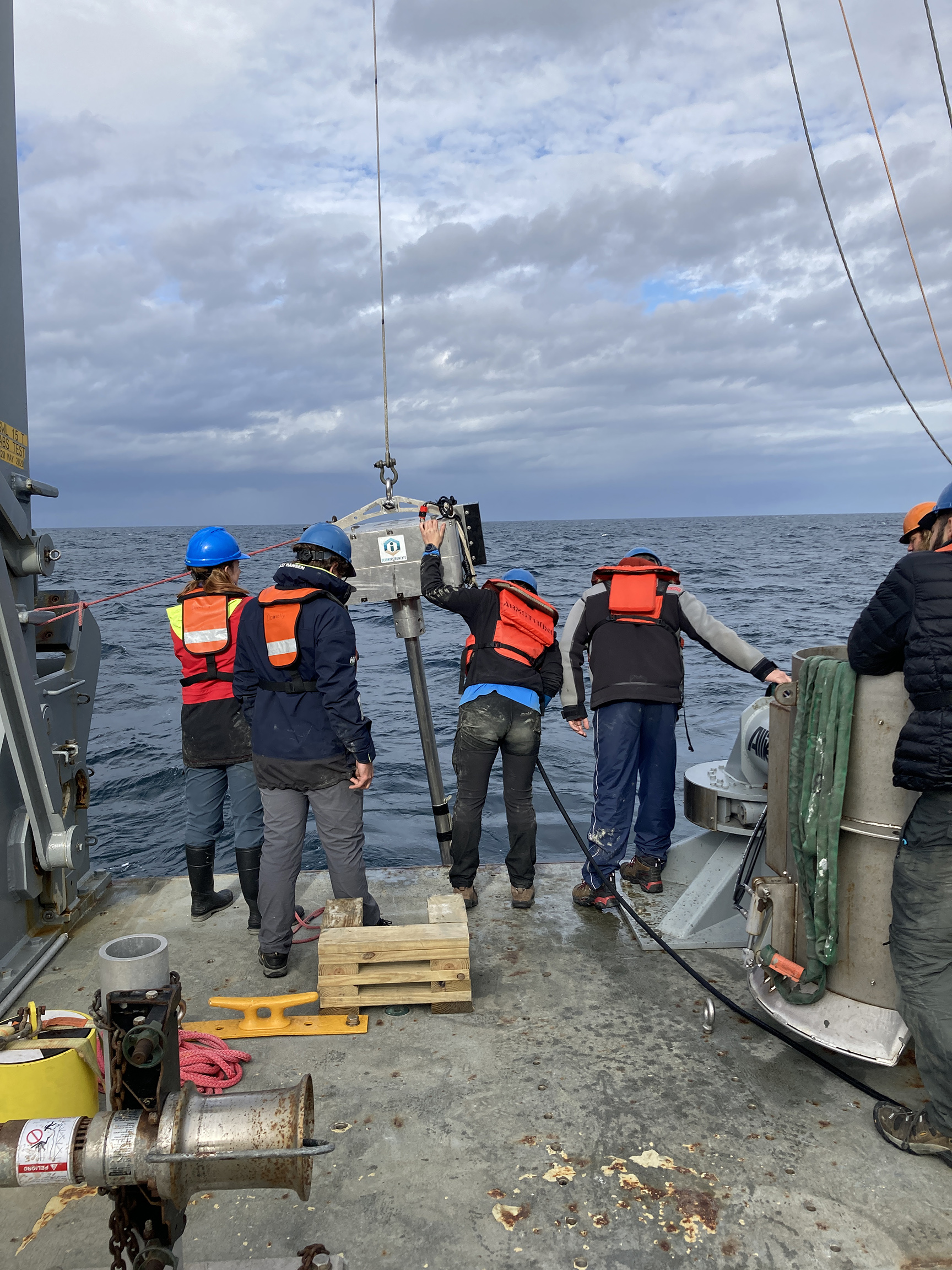 Researchers on the research vessel Armstrong use vibracore equipment to extract sea-floor sediment cores for the Woods Hole Oceanographic Institution in 2021. Photo by Chris Fanshier.