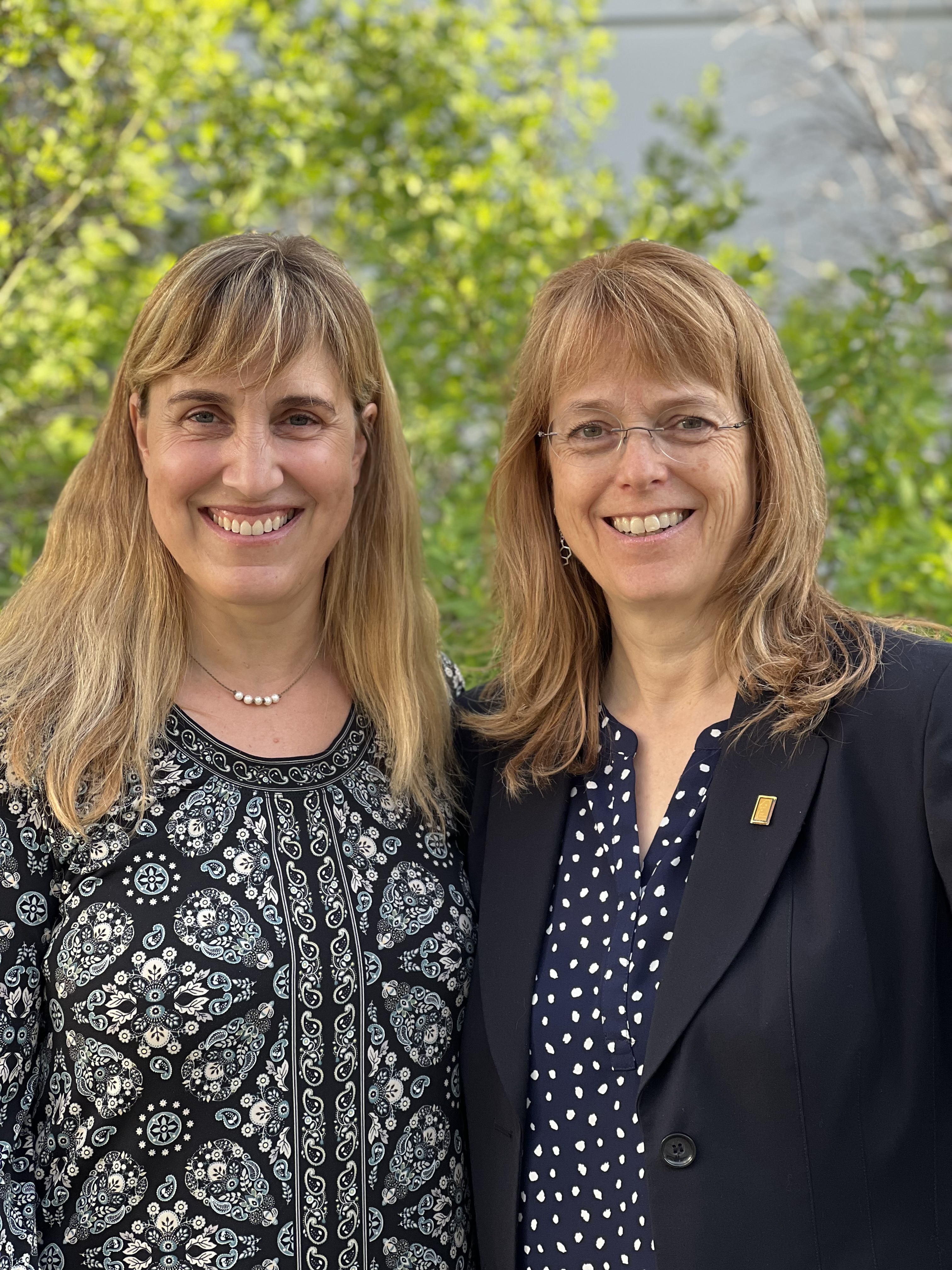 Gwen Holdmann, associate vice chancellor for research, and Nettie La Belle-Hamer, vice chancellor for research