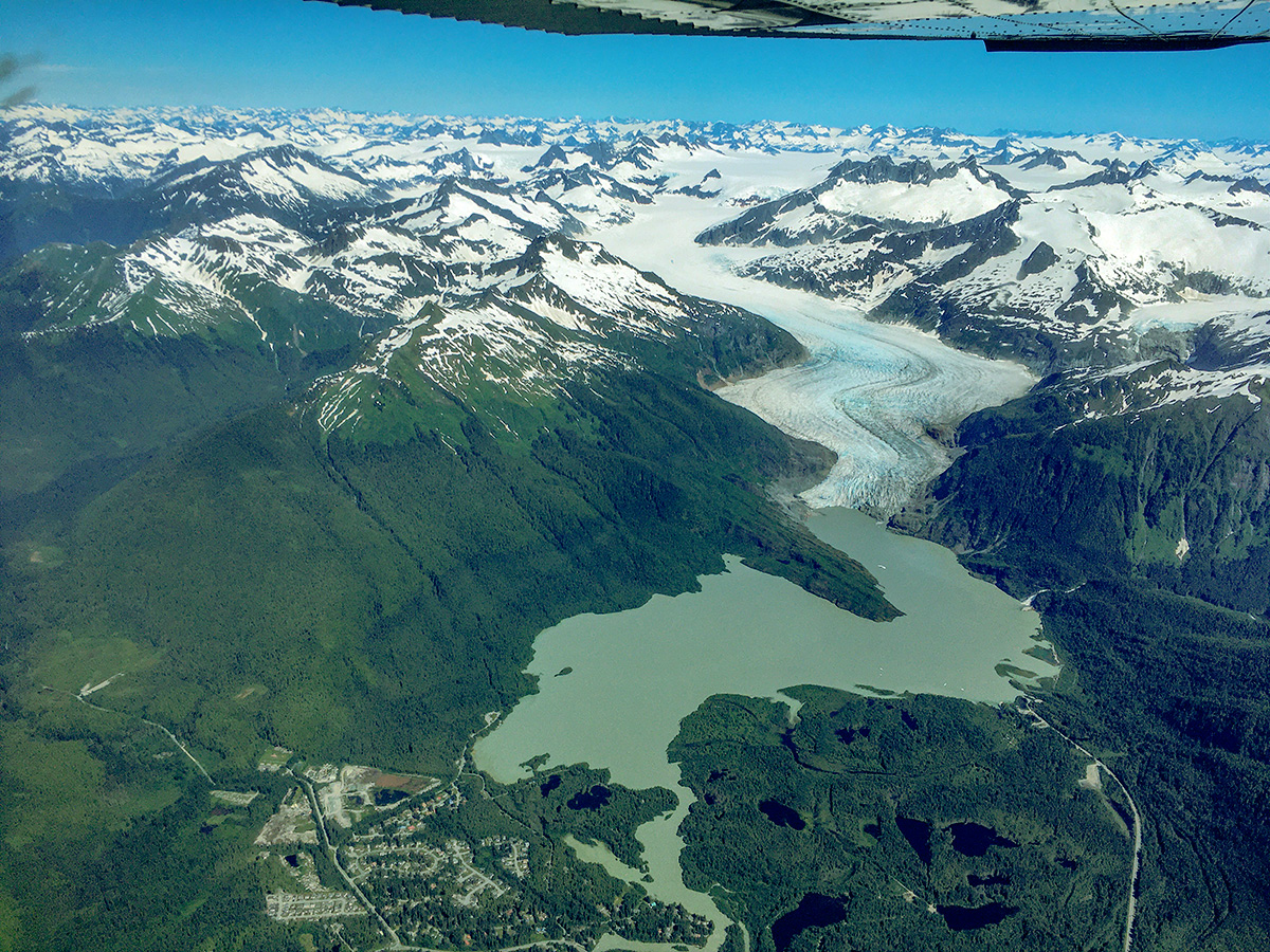 Looking out from a plane flying over the Lynn Canal region while conducting aerial imaging. Photo courtesy of Martin Stuefer.