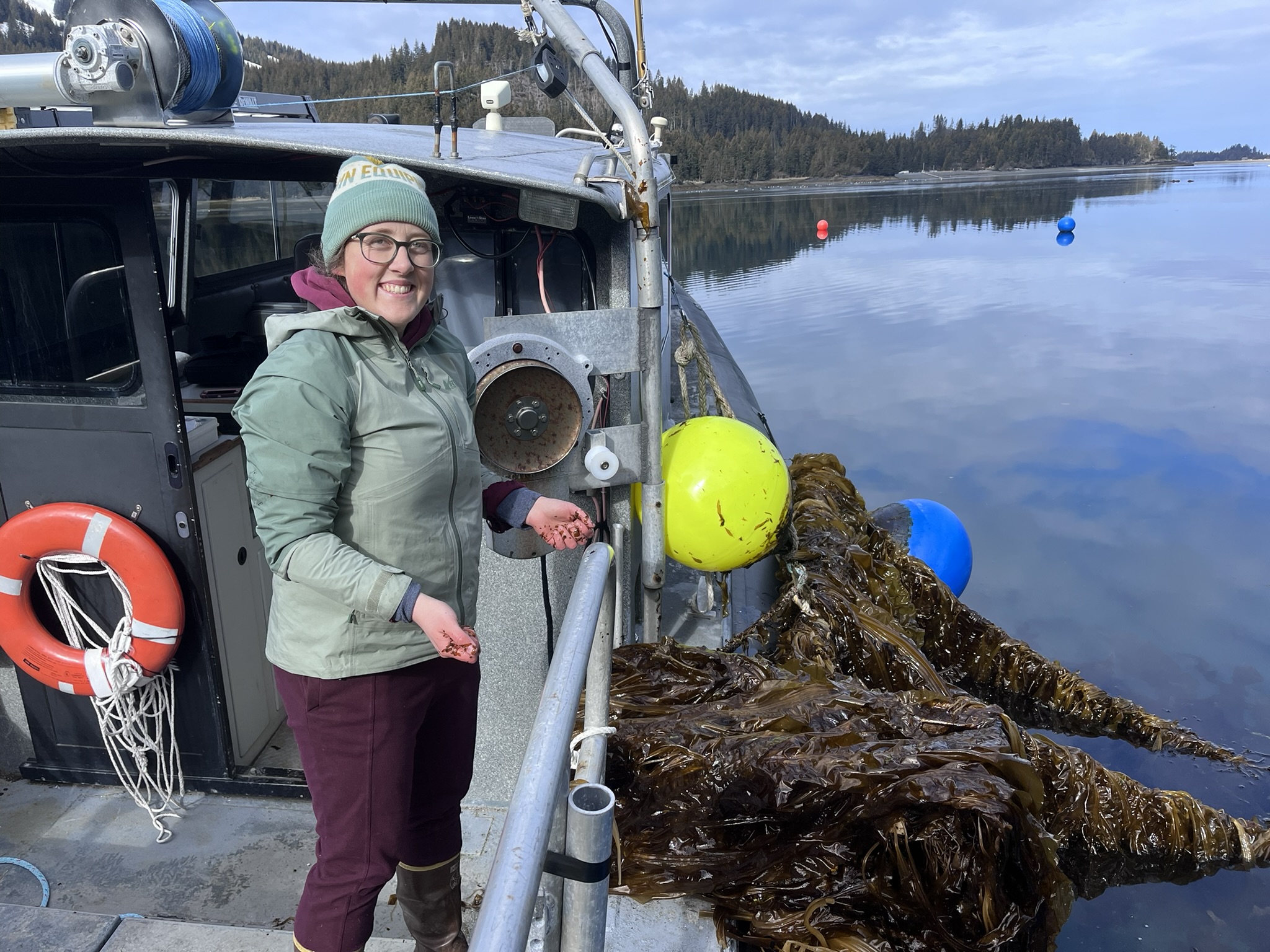 Josianne Haag recovers a mooring in a kelp farm in Jakolof Bay, Alaska.