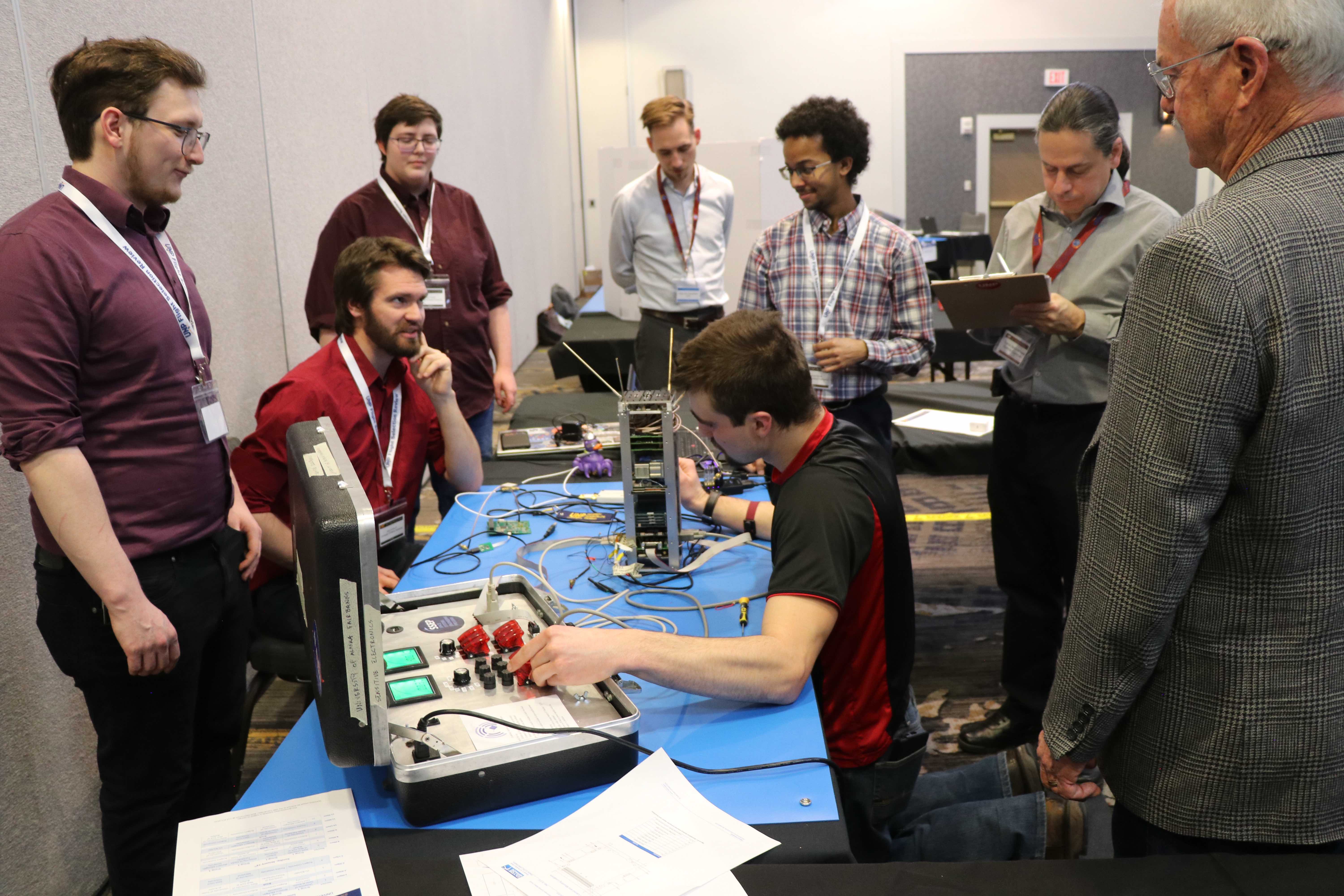 UAF nanosat team and judges