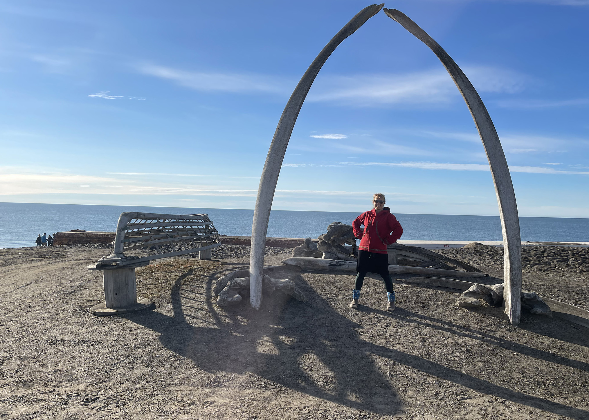 Nettie La Belle-Hamer takes a moment to enjoy a sunny day in Utqiagvik during the 75th anniversary celebration for the Naval Arctic Research Laboratory.