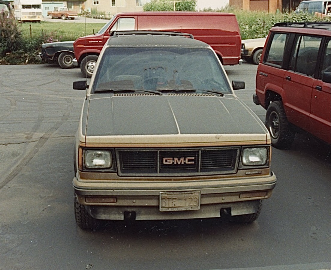 A layer of gray ash from Mount Spurr volcano’s Aug. 18, 1992, eruption coats the hood, windshield and roof of Julie Stricker’s GMC vehicle in Anchorage. The eruption blanketed the city in about one-eighth inch of ash.