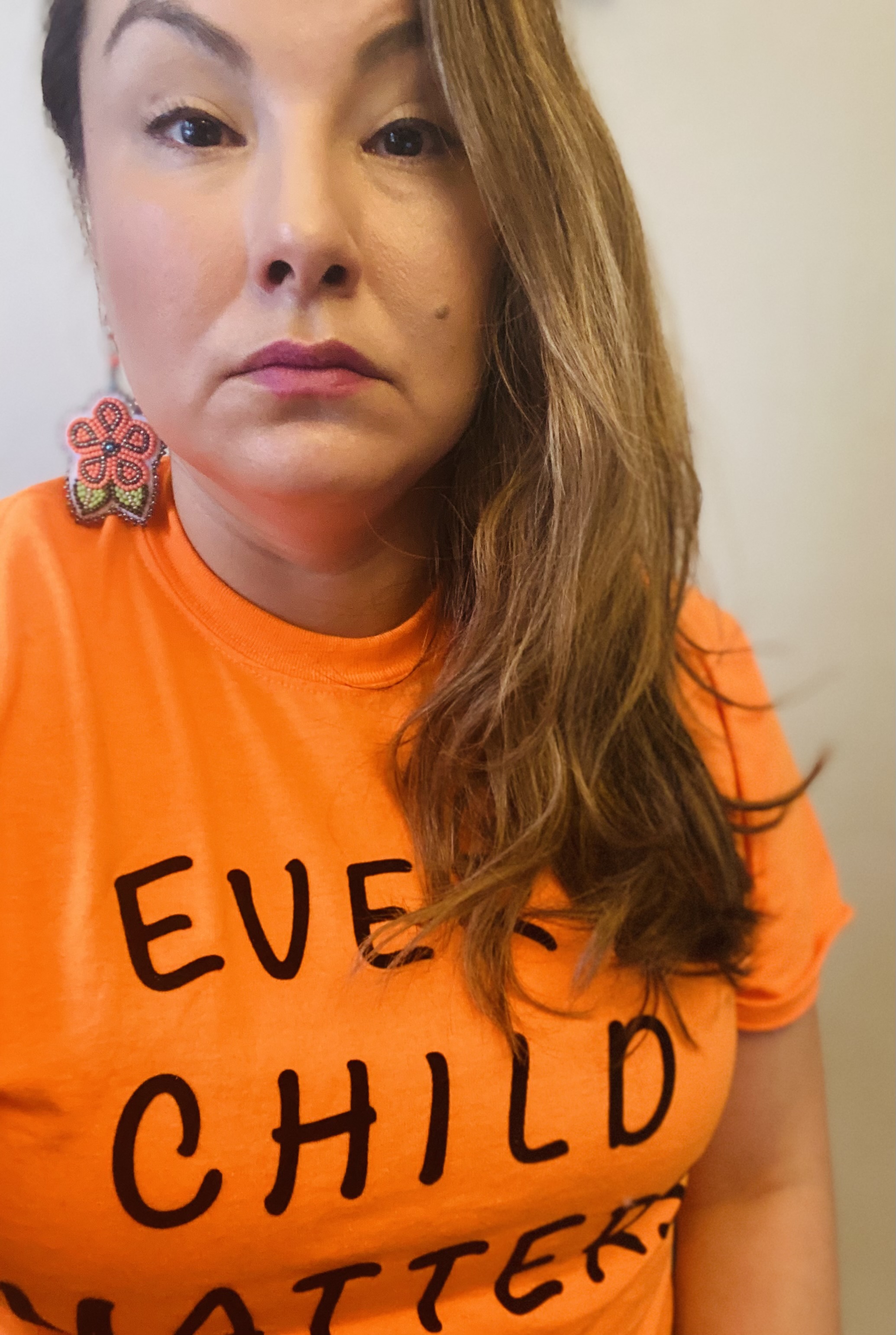 woman in orange t-shirt