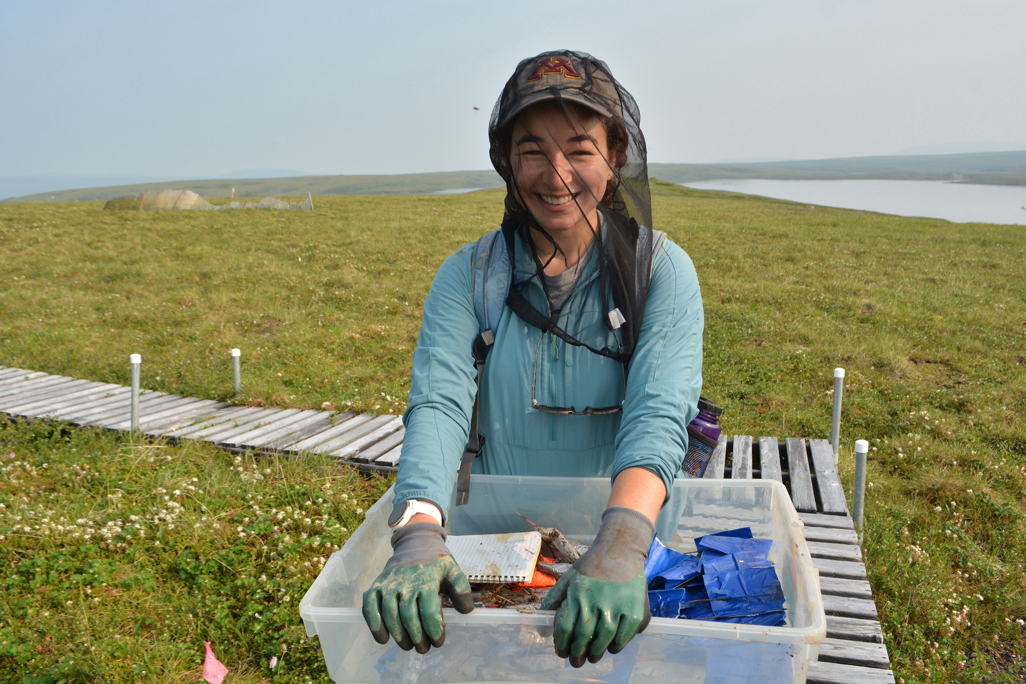 TUNDRA awardee carries field supplies in the Arctic tundra near Toolik Field Station