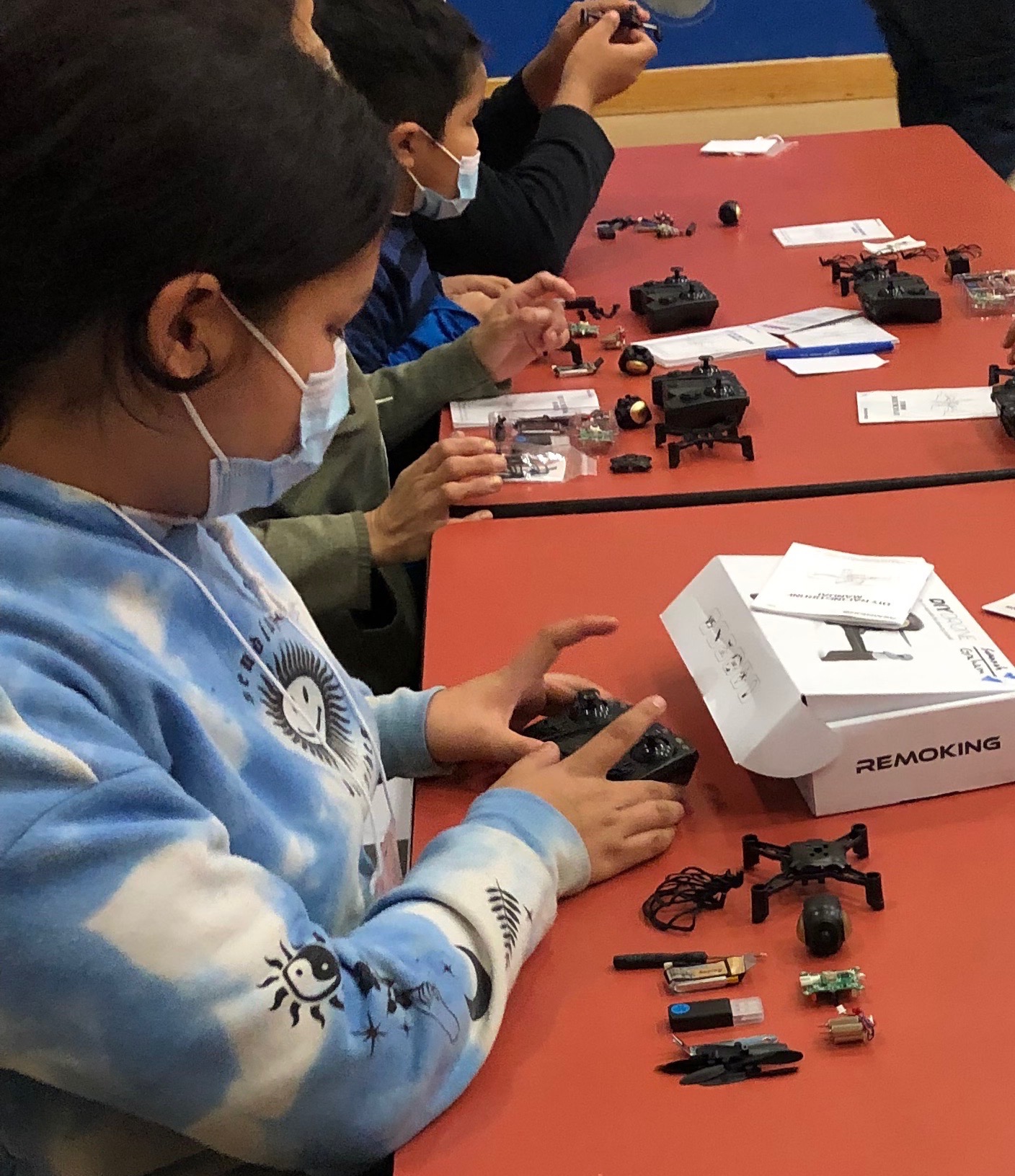 A student at John Fredson School in Venetie, Alaska, works with one of the drone kits provided by the Alaska Satellite Facility through a NASA grant. 