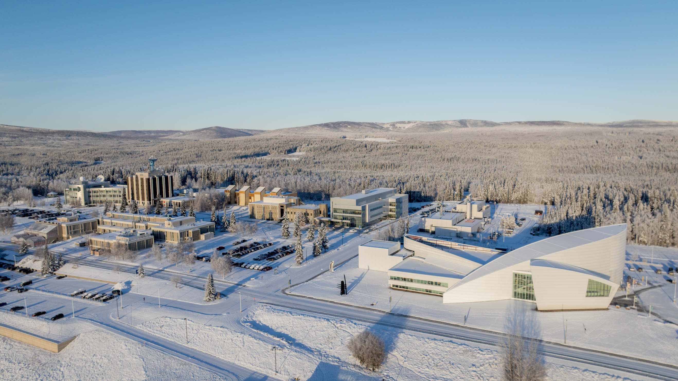 The West Ridge research area at the University of Alaska Fairbanks nestles against frosted woodlands in November 2025. Photo by Eric Marshall