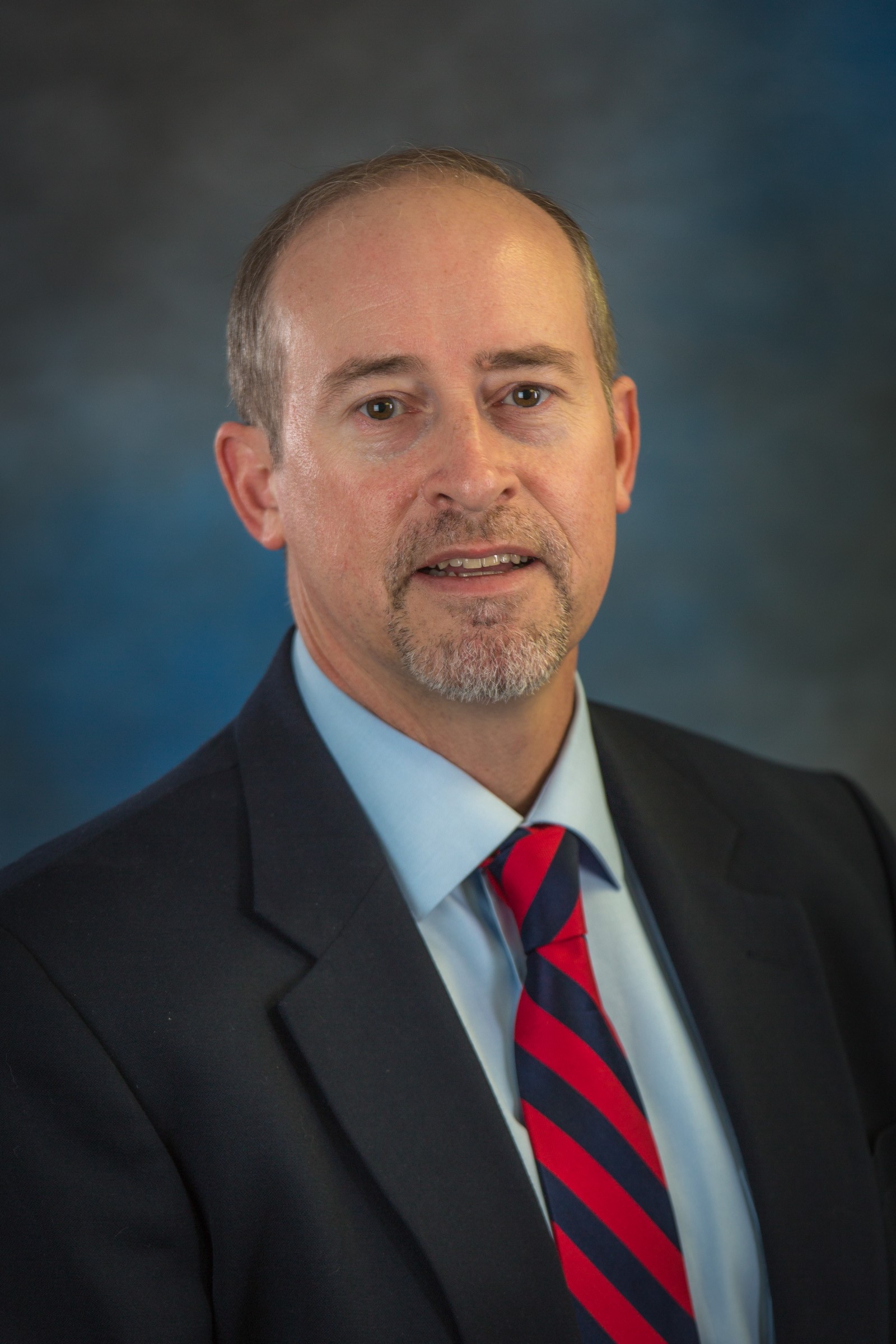 Headshot photo of Cameron (Cam) Carlson, dean of the University of Alaska Fairbanks College of Business and Security Management.
