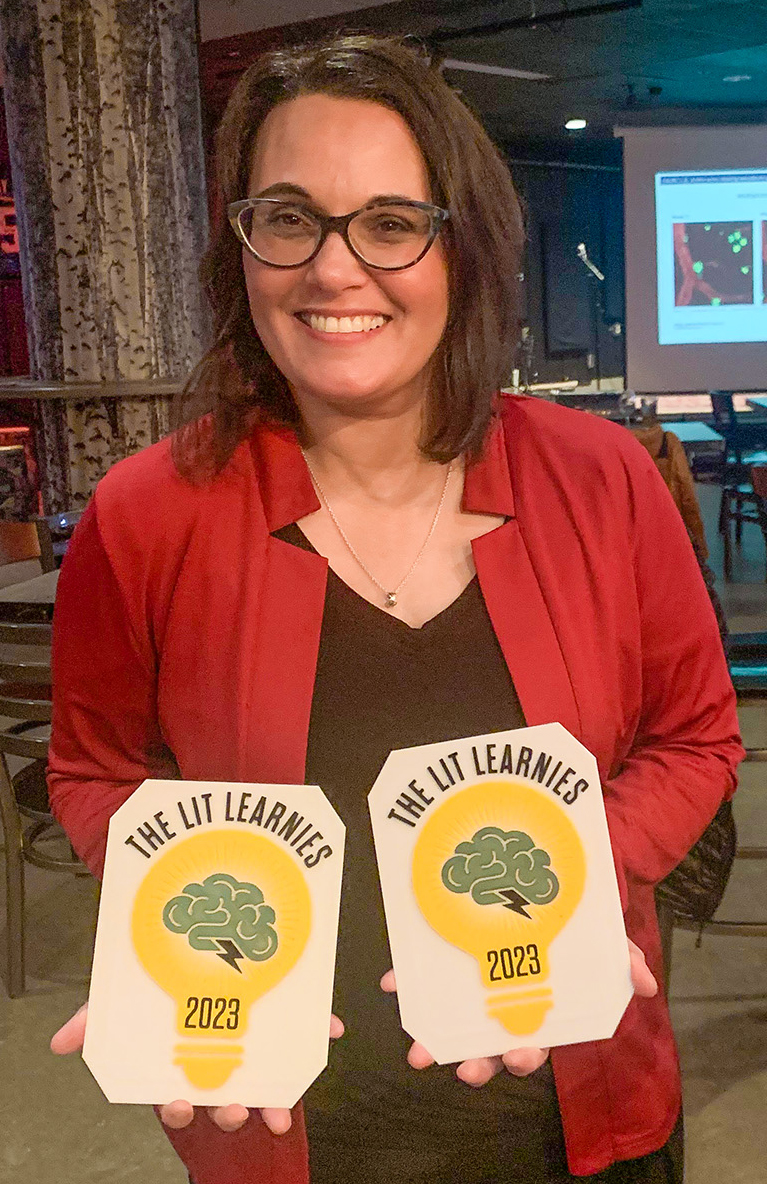 CTC instructor Laurel Keyer at the UAF Pub with the Learnie Awards presented to her and Lizanne Hanson.