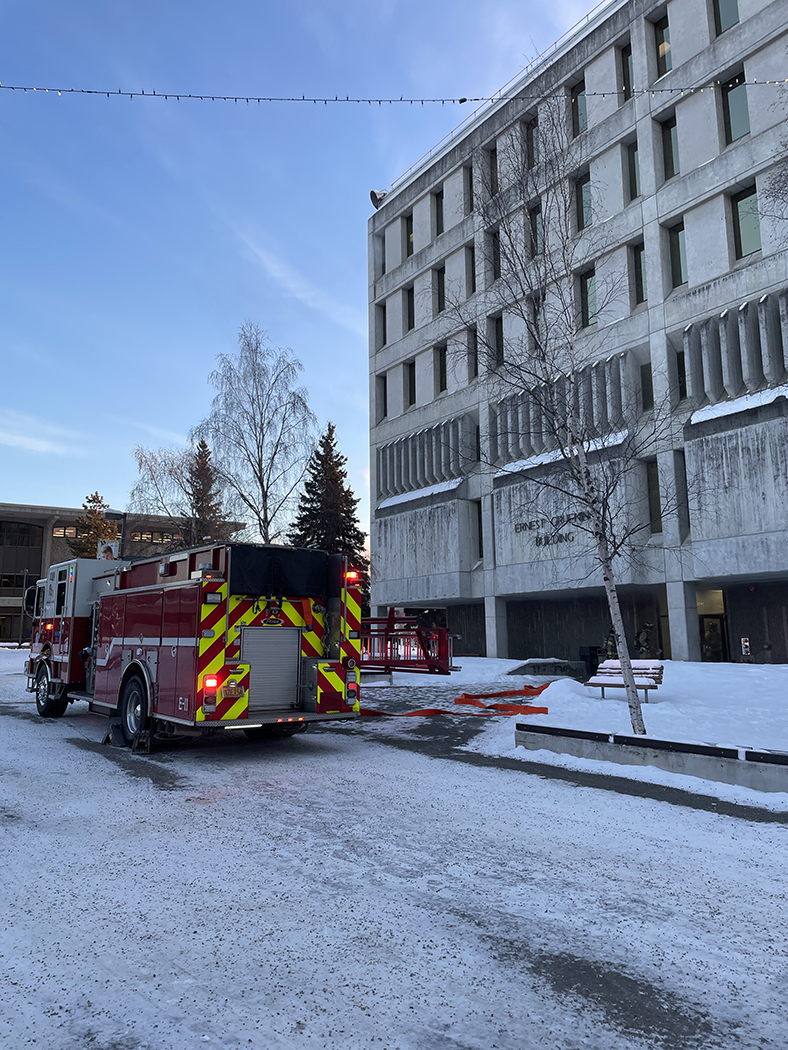 University of Alaska Fairbanks firefighters respond to a burst pipe in the Gruening Building on Tuesday, Dec. 9, 2025.