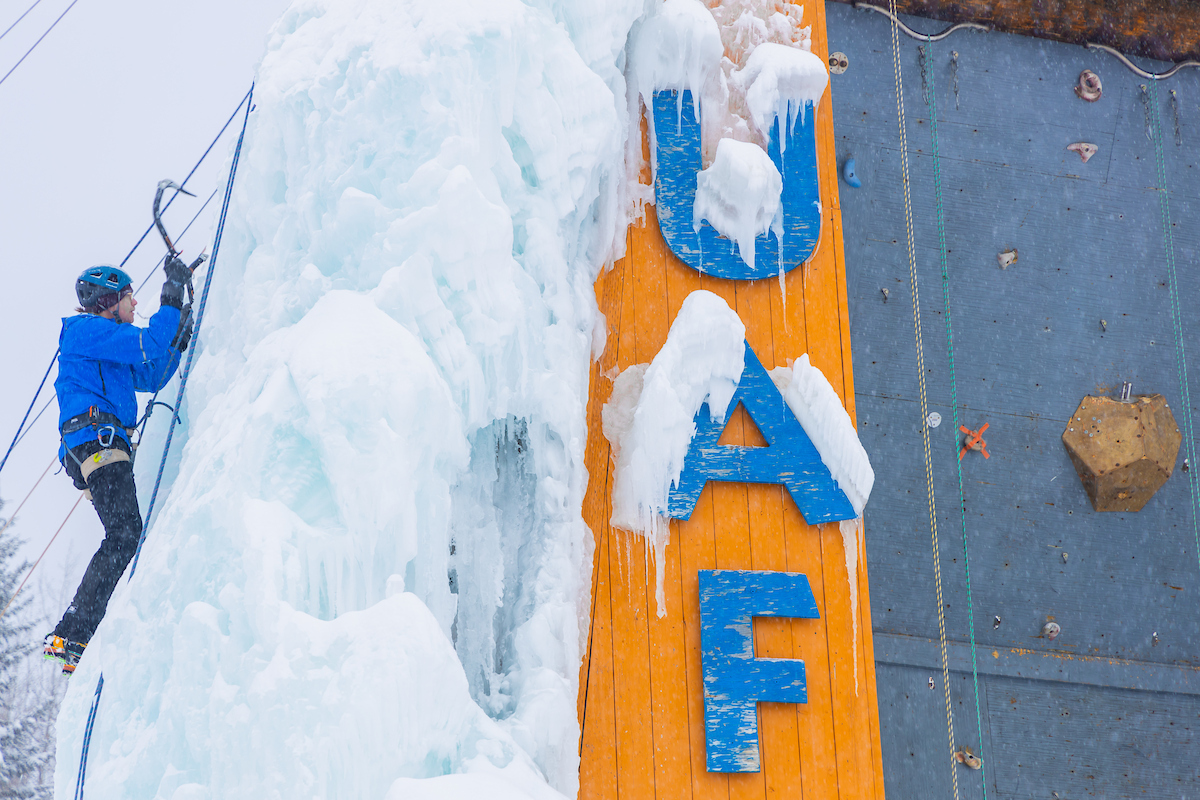 A student climbs the ice climbing wall outside the Student Recreation Center on the University of Alaska Fairbanks campus on Feb. 14, 2026.