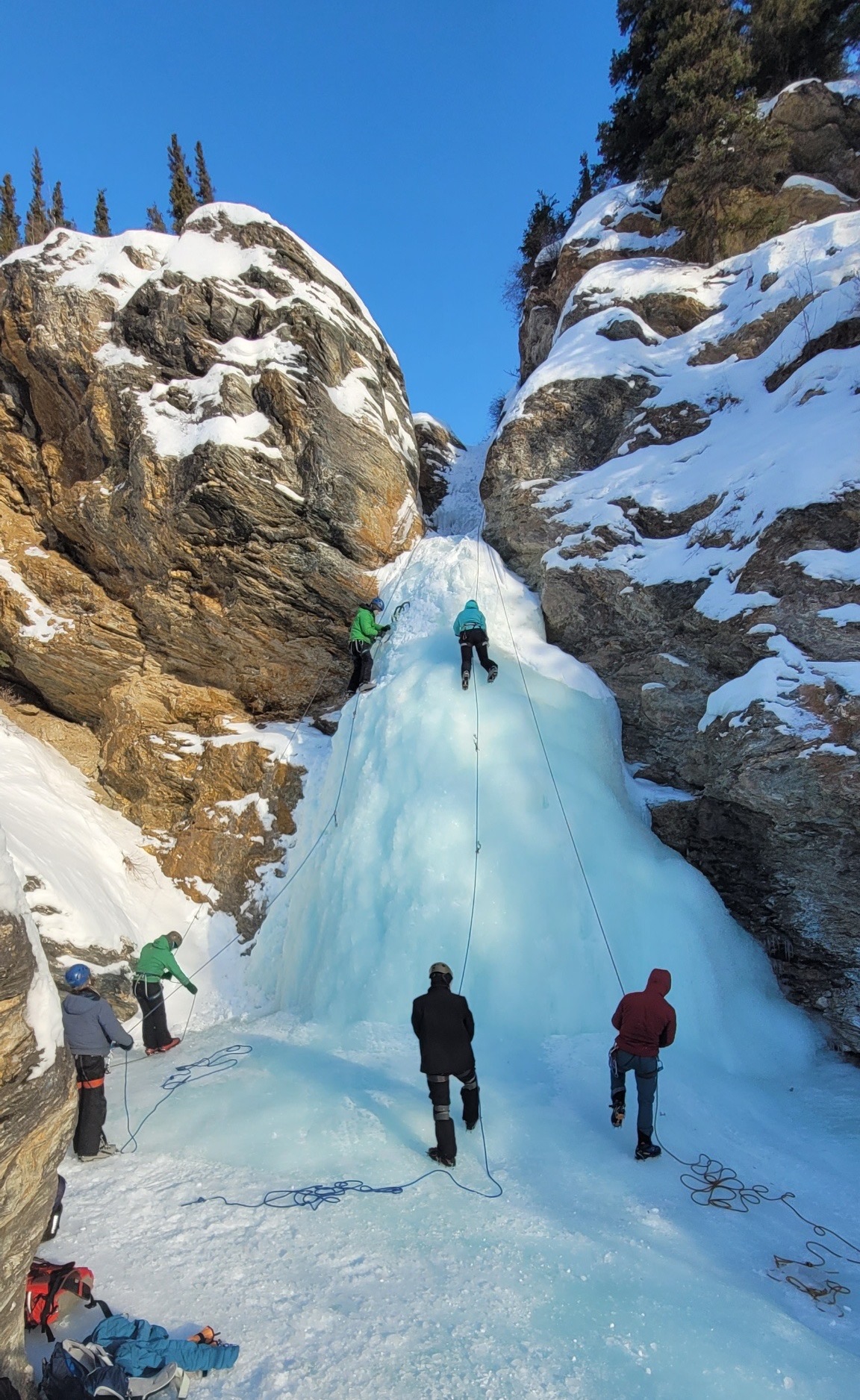 UAF students ice climbing at Dragonfly Creek.